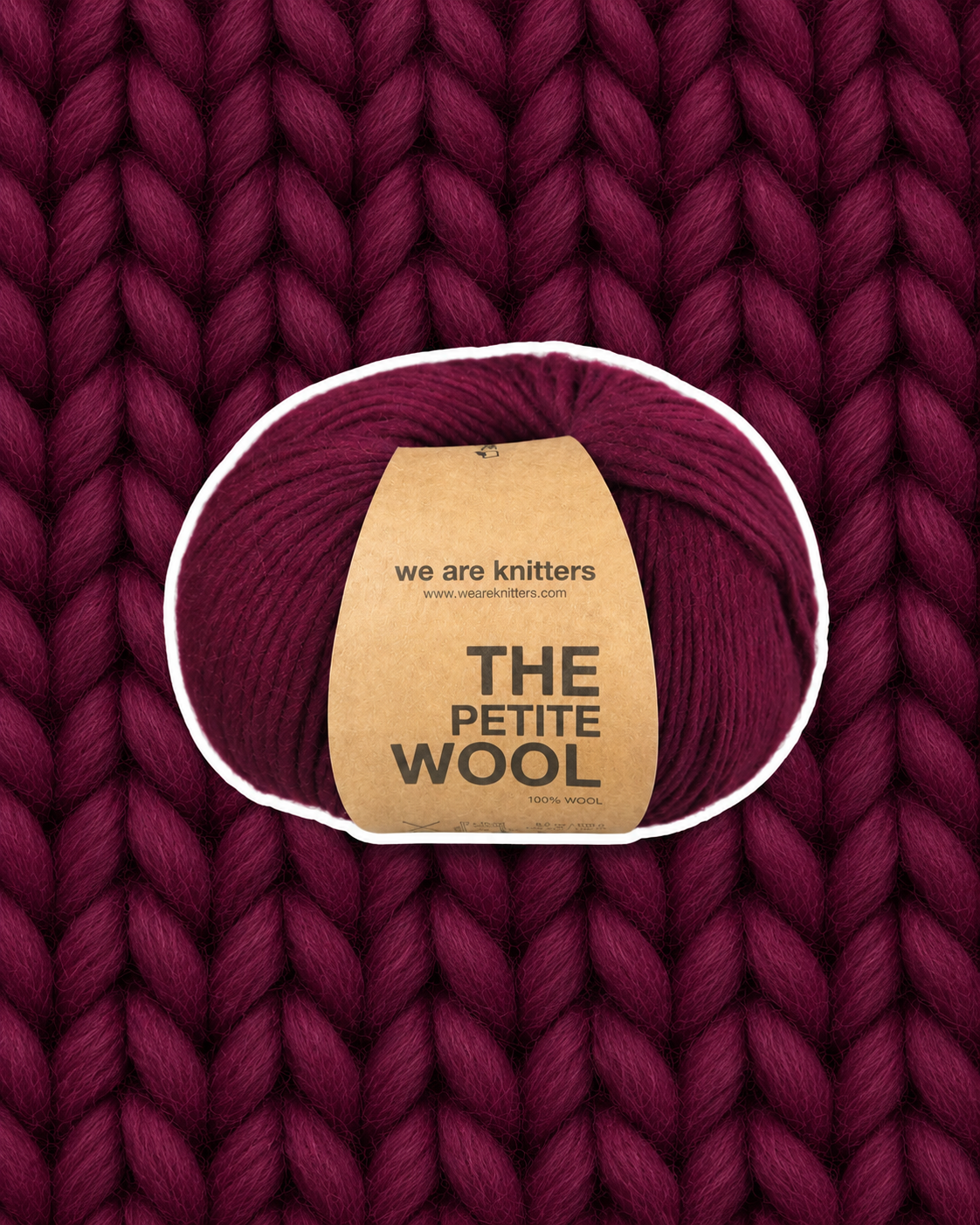 Petite Wool Wine yarn ball on a matching knit swatch